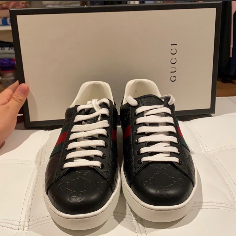 Black GG Gucci leather sneakers